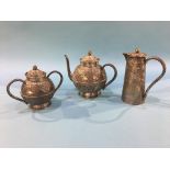 A Middle Eastern silver coloured teapot, water jug and sugar bowl, weight 16.9oz