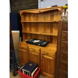 A pine dresser, drop leaf table and chairs