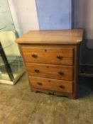 A chest of three drawers