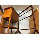 A wooden towel drying stand and wooden sewing box