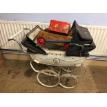 A vintage pram, doll, Triang baby walker etc.