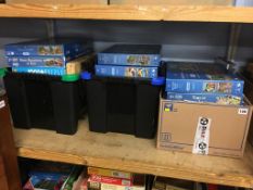A shelf of boxed jigsaw puzzles