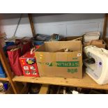 A shelf of assorted to include 'Janome' sewing machine, boxed camera monitoring system and LPs etc.