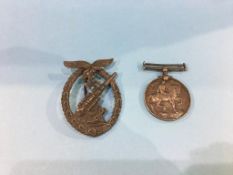 A 1914-1918 medal awarded to 472343 SPR W. Morton RE and a German World War II Luftwaffe brooch