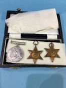 A 1939-1945 medal and two Star medals