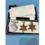 A 1939-1945 medal and two Star medals