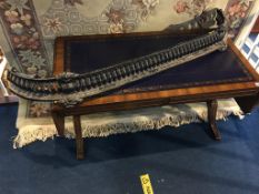 A reproduction mahogany sofa table with blue inset leather top