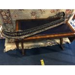 A reproduction mahogany sofa table with blue inset leather top