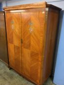 A decorative double door wardrobe, painted with flowers