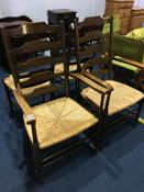 Four ladderback chairs, two standard and two carvers