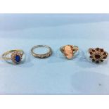 Three 9ct gold dress rings and another stamped 18ct, total weight 9.9 grams