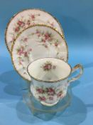 A Paragon Victoriana Rose pattern tea set, to include six cups, six saucers, six small plates, one