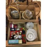 Three boxes assorted to include place settings, wicker baskets etc.