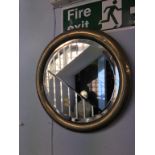 Circular brass framed mirror, 43cm diameter