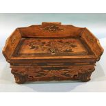 An Oriental sarcophagus shaped wooden jewellery box