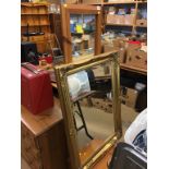Gilt mirror, pine cheval mirror, pine chest of drawers and a pine cabinet