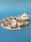 A complete crested ware 'Bemma' miniature tea service, featuring City of London coat of arms (16)