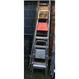 Four sets of step ladders