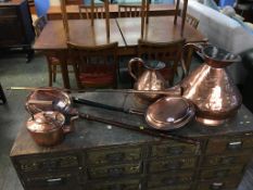 A selection of copper ware, bed warming pans etc.