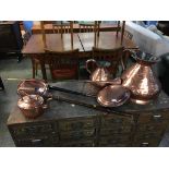 A selection of copper ware, bed warming pans etc.