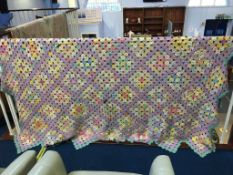 An American multicoloured patchwork quilt