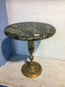 A small occasional table with marble top and brass stand