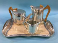 A Picquot ware teapot, coffee pot, milk jug and tray