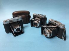 Three coupled Rangefinder 120 film cameras