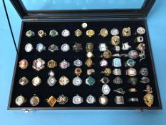 Display tray containing a collection of watch rings etc.