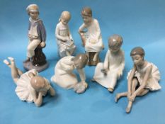 Seven various figures, Lladro etc.