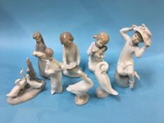 Eight various figures, Lladro etc.