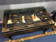 Oriental lacquered coffee table, 92cm wide