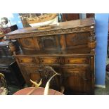 An oak court cupboard