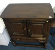 Oak Ercol two door cabinet, 79cm wide