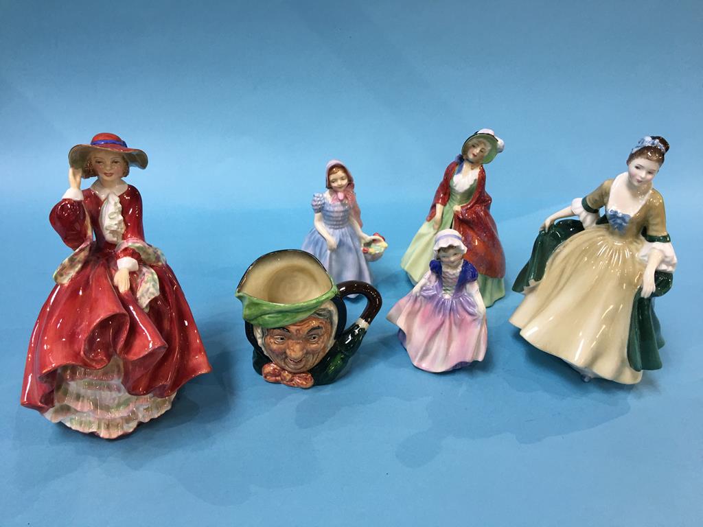 Five Royal Doulton figures and a tray jug