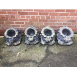 Set of four composite stone garden planters