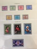 2 albums of Jersey and Guernsey stamps (sample is illustrated)