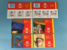 9 booklets of 10 1st Class Christmas stamps, 14 booklets of 20 2nd Class Christmas stamps and 1