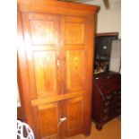 Early 20th century light oak corner cupboard appro