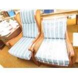 2x Rattan upholstered arm chairs