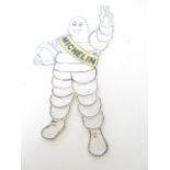 Cast iron Michelin man wall plaque