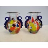 Pair of twin handled glass vases