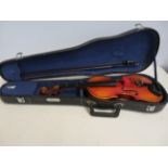 Cased violin with bow