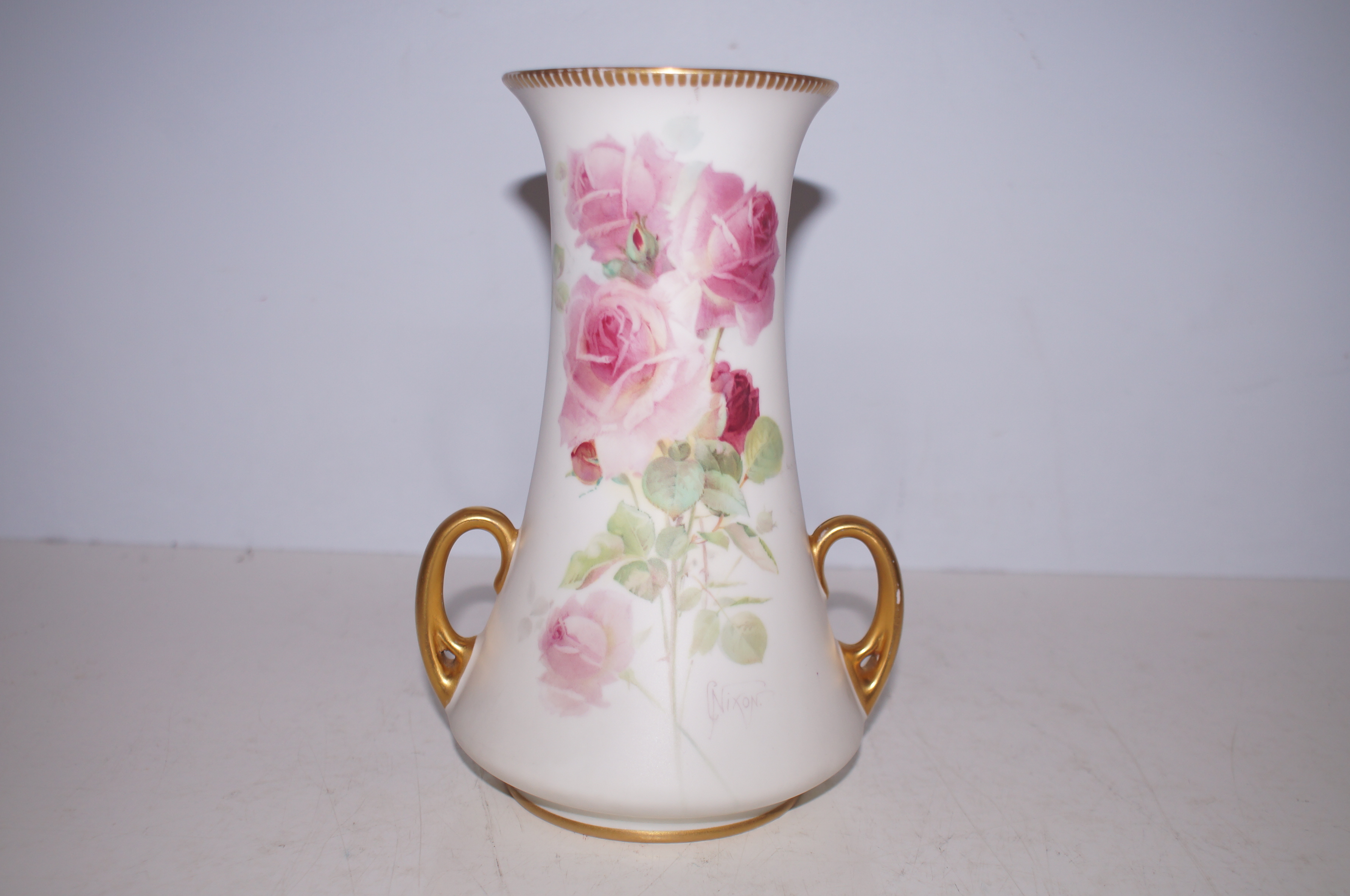 Royal Doulton vase, signed Nixon