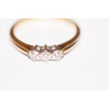 18ct Diamond ring set with 3 diamonds in a platinu