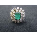 18 carat white gold emerald and diamond cluster ri