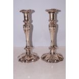 Pair of ornate silver plate candlesticks