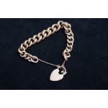 9ct Gold bracelet with heart shaped locket & safet