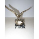 Heavy polished metal eagle on a marble base Wing s