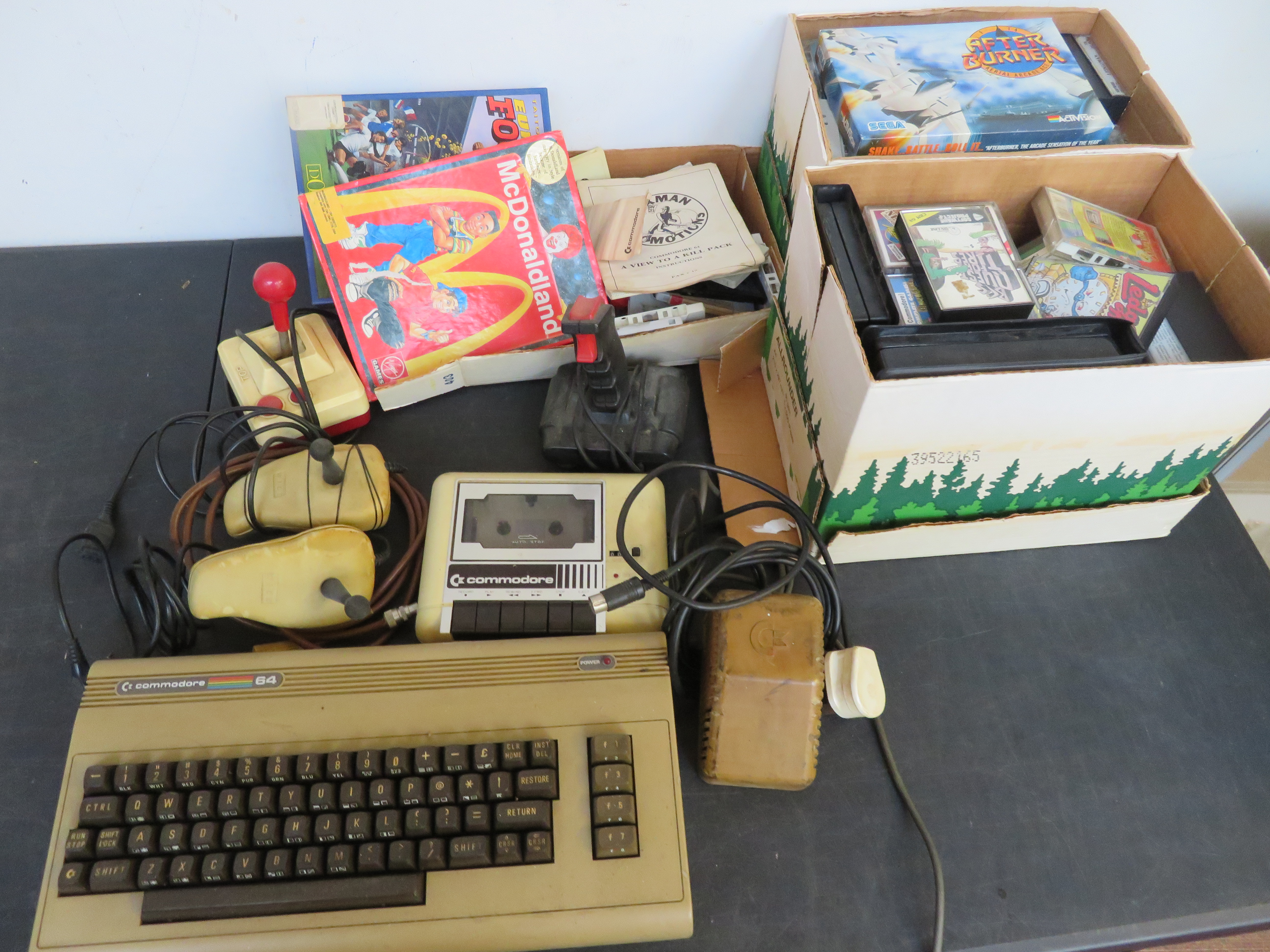 Commodore 64 with 4 joy sticks, power pack, keyboa